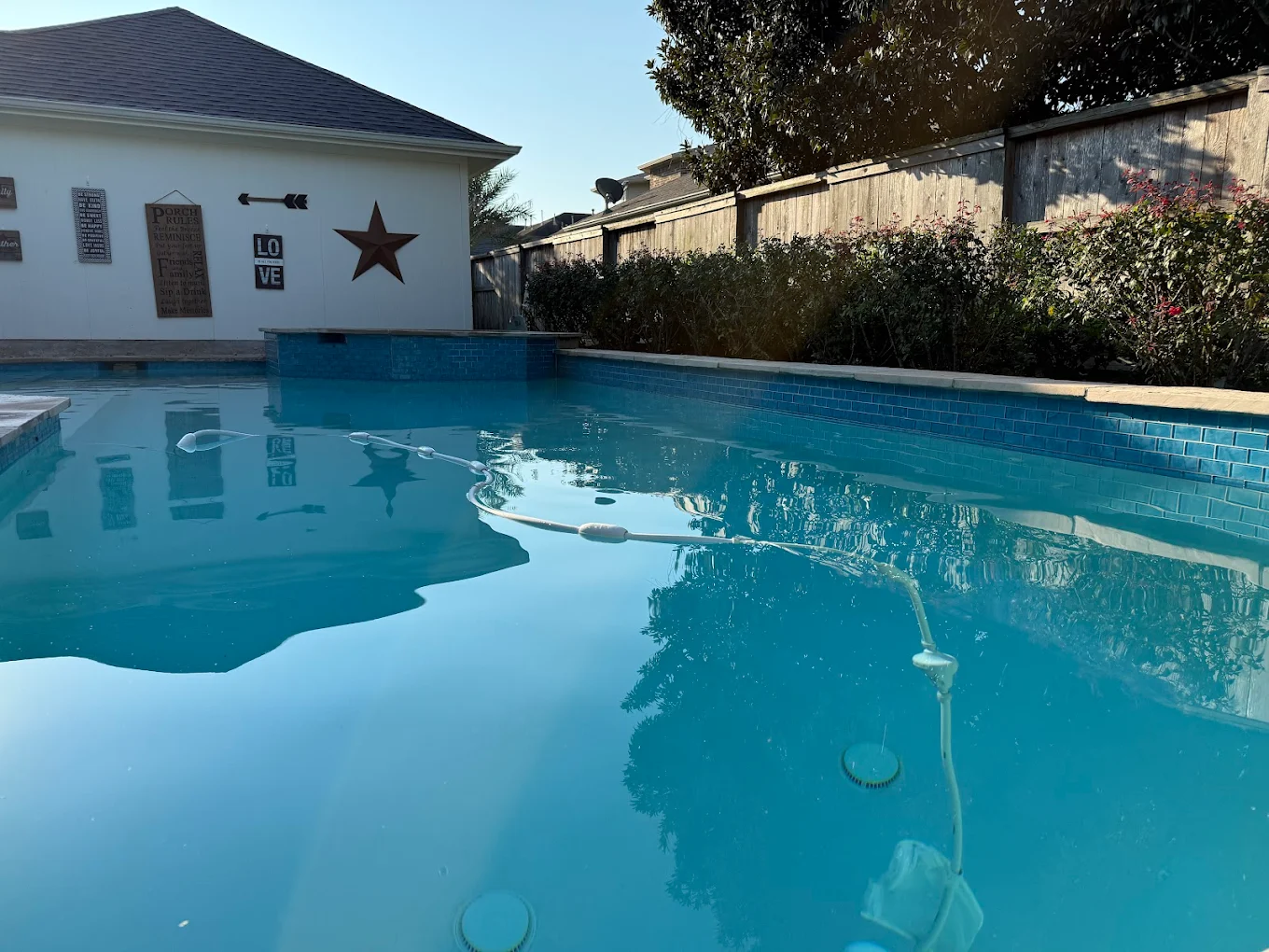 Crystal-clear residential pool kept clean by Lanterra Pools weekly service